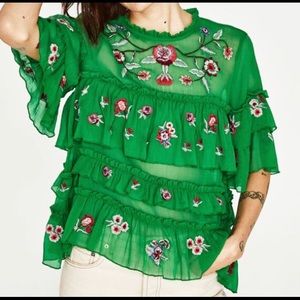 Embroidered blouse with ruffles. SizeS